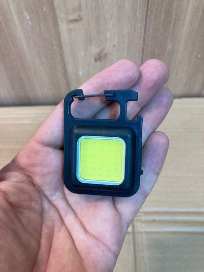 Compact and Powerful: COB Rechargeable Keychain Light.