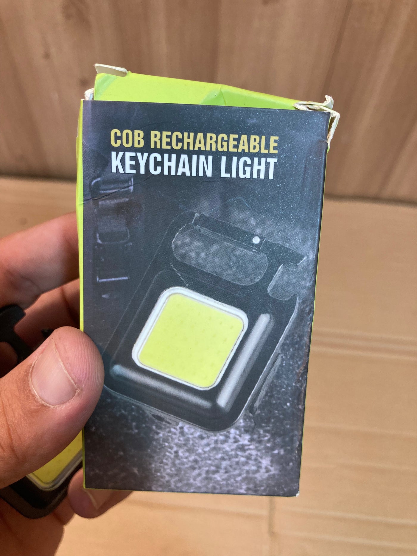 Compact and Powerful: COB Rechargeable Keychain Light.