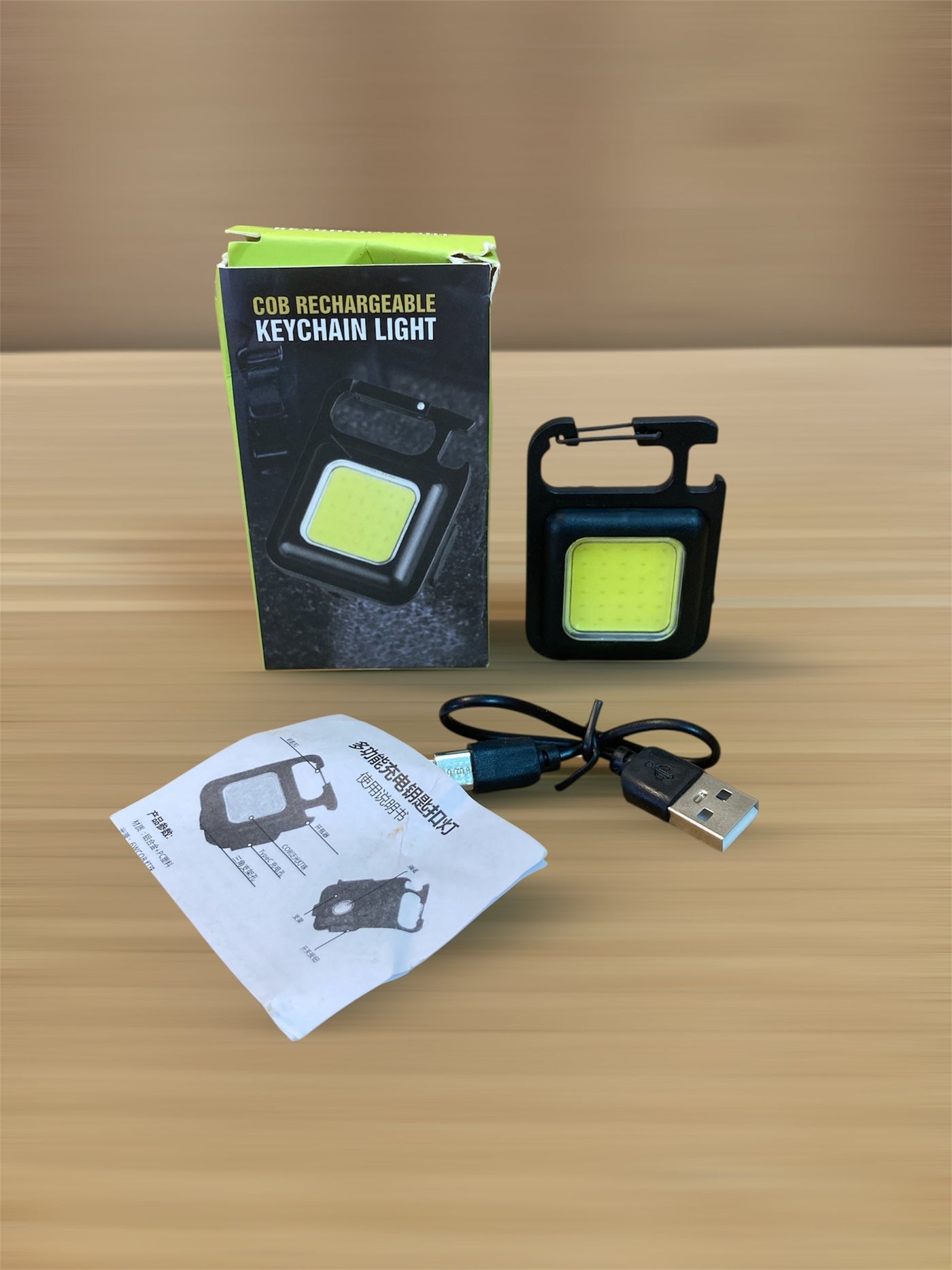 Compact and Powerful: COB Rechargeable Keychain Light.